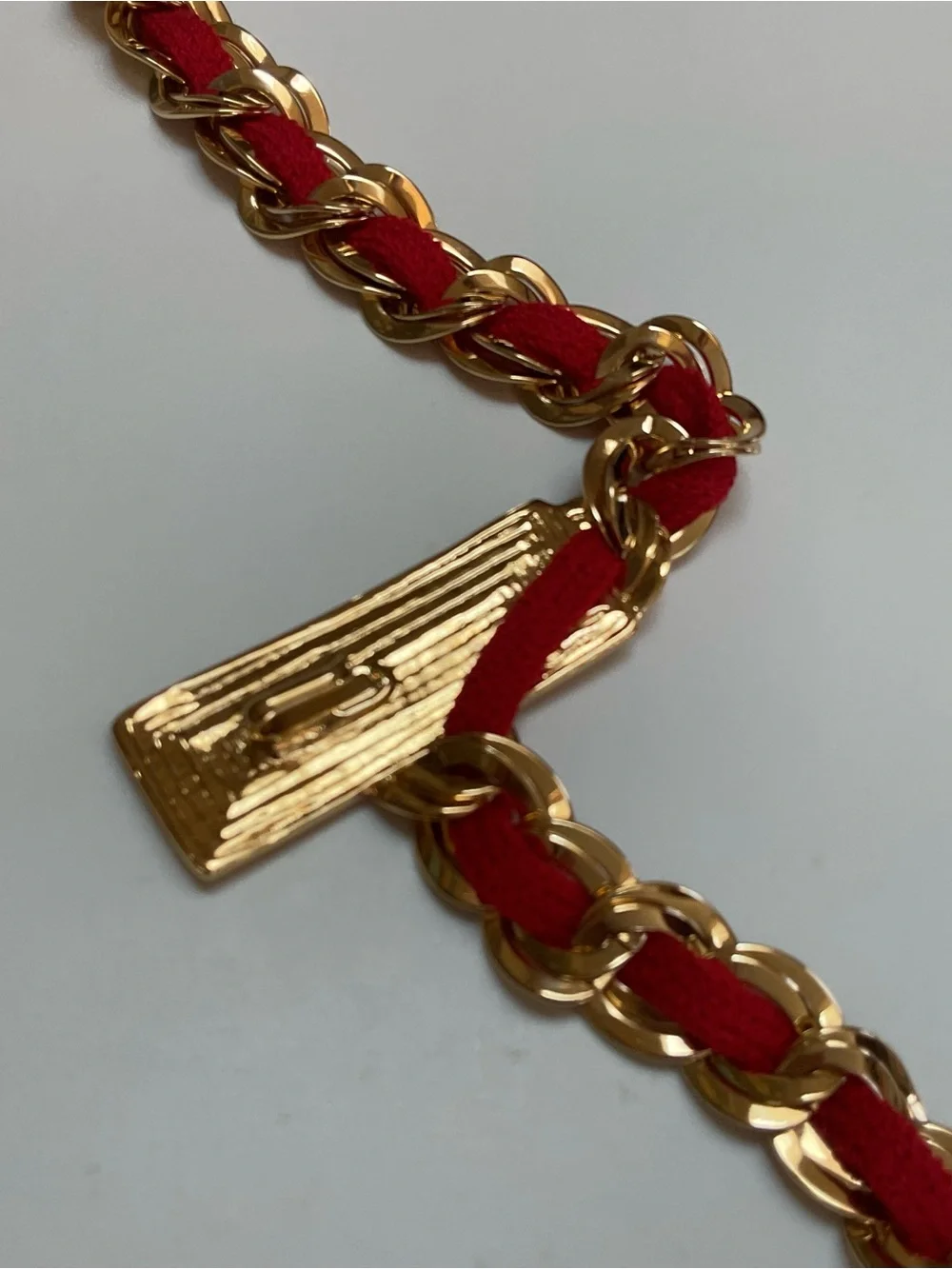 St. John Red and Gold Adjustable Braided Chain Belt with Logo Plate